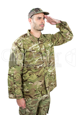 Confident soldier saluting