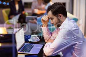 Businessman working on laptop