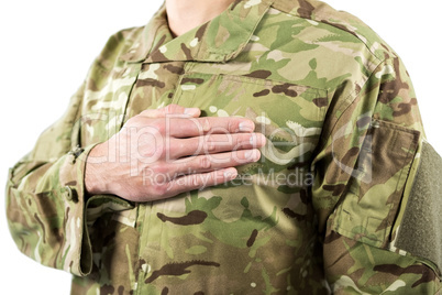 Mid section of soldier taking oath