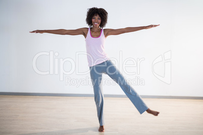 Woman performing stretching exercise