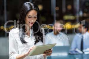 Businesswoman using digital tablet