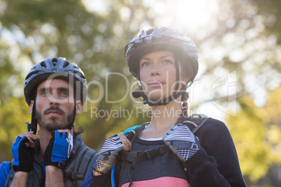 Biker couple standing together