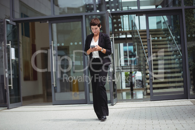 Businesswoman using mobile phone