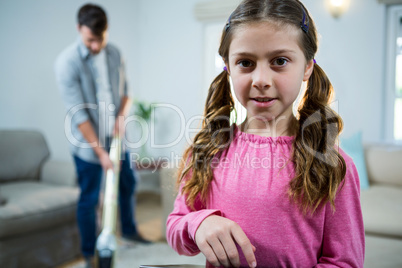 Girl using digital tablet in the living room