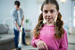 Girl using digital tablet in the living room