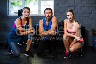 Young determined athletes in gym