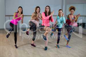 Group of women performing aerobics