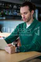 Man using digital tablet