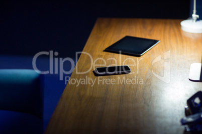 Digital tablet and mobile phone on office desk