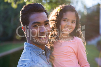 Father carrying daughter in his arms Father carrying daughter in his arms