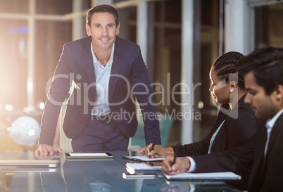 Businessman with coworkers in a meeting in the conference room