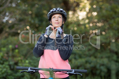 Female biker wearing bicycle helmet