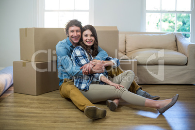 Couple sitting on the floor