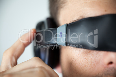 Man wearing virtual video glasses