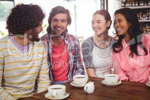 Group of friends having cup of coffee
