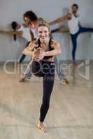 Woman performing stretching exercise