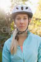 Portrait of female mountain biker in the forest