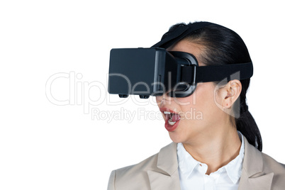 Businesswoman using virtual reality headset