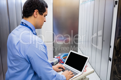 Technician using laptop