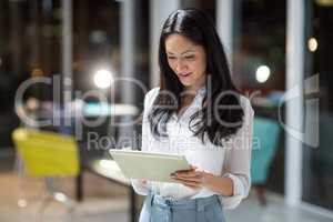 Businesswoman using digital tablet