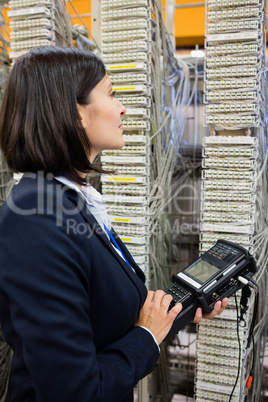 Technician using digital cable analyzer