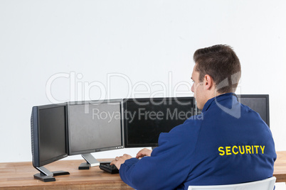 Security officer using computer