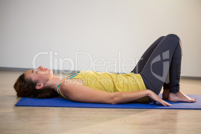 Woman performing yoga exercise