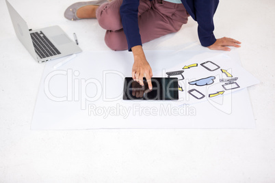 Businesswoman using digital tablet