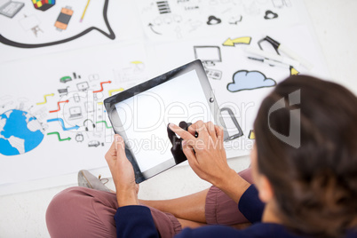 Businesswoman using digital tablet