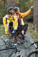 Biker couple taking selfie from mobile phone