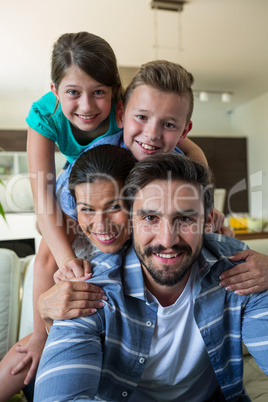 Happy family having fun in living room