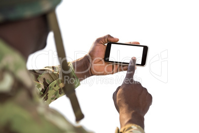 Soldier using a mobile phone