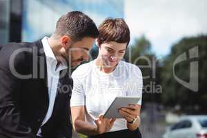 Businesspeople discussion on digital tablet