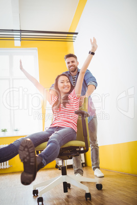 Portrait of happy business people enjoying at creative office