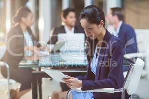 Businesswoman using digital tablet