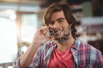 Portrait of man talking on mobile phone