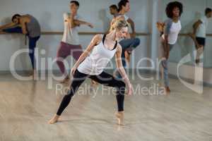 Woman performing stretching exercise