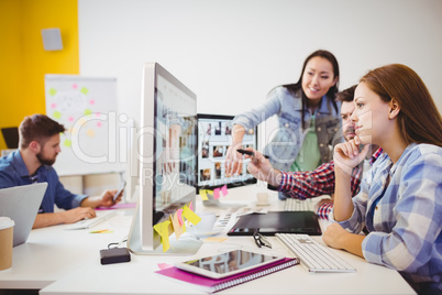 Business people working with computers