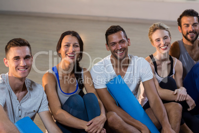 Group of people sitting on floor