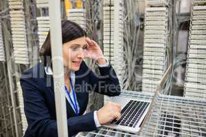 Technician using laptop