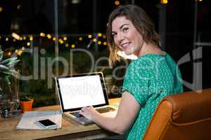 Businesswoman working on laptop