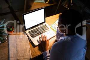 Businesswoman working on laptop