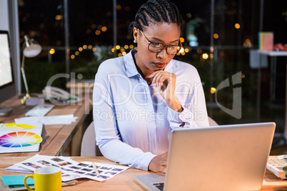 Businesswoman working on laptop