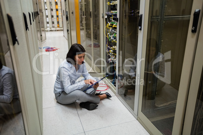 Technician using digital tablet