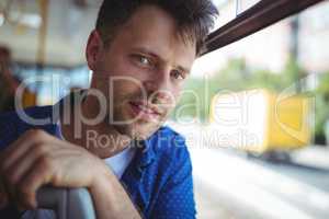 Portrait of man traveling in bus