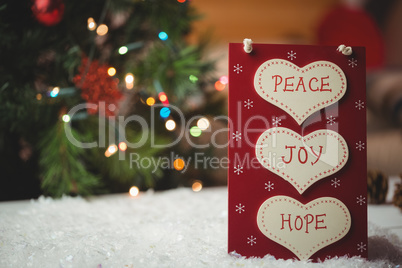 Christmas label with massages of peace, joy and hope