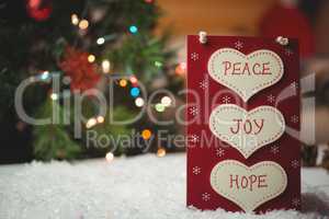 Christmas label with massages of peace, joy and hope