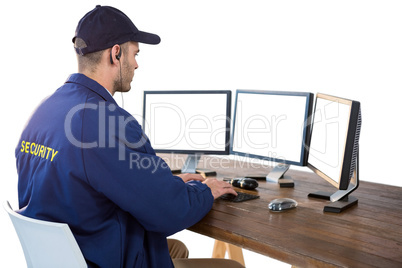 Security officer using computer