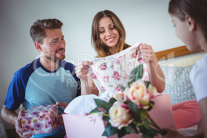 Daughter giving present to her mother