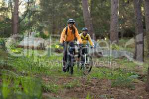 Biker couple cycling in countryside